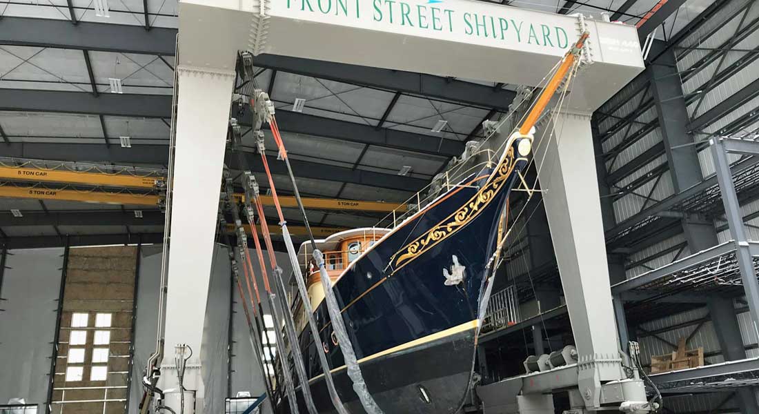 Front Street Shipyard Building 6 with yacht Atlantide