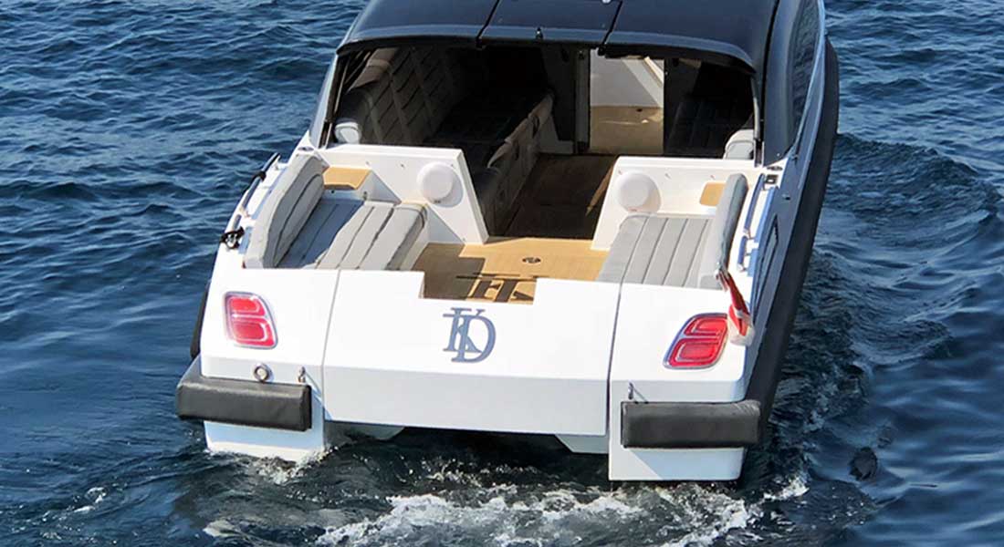 this Wooden Boats WB27 megayacht tender has Bentley tail lights