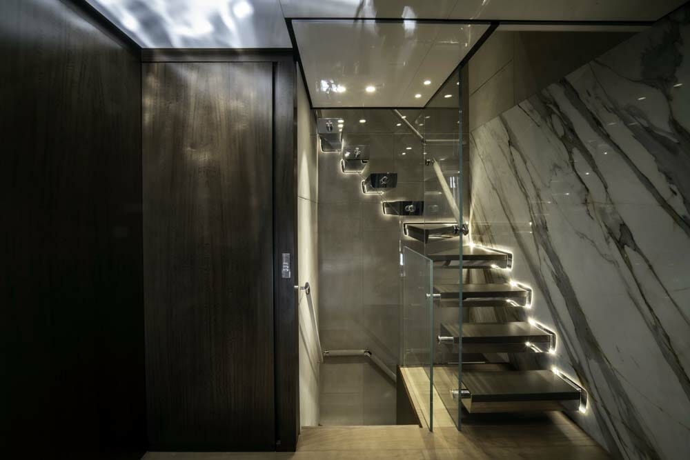 stairs seem to float aboard the Baglietto yacht Enterprise