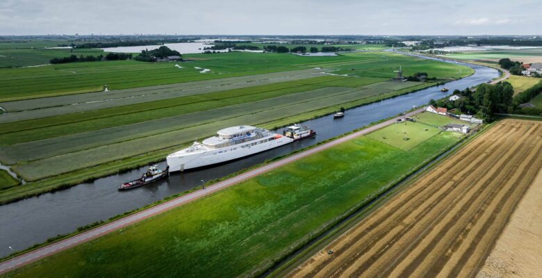 the Feadship yacht Project 825 in tow